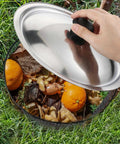 4 Pack Inground Worm Composters With Lids For Outdoor Use 9.1 By 9.1 By 5.9 Inches Turn Kitchen Scraps Into Rich Soil For Raised Garden Beds Eco Friendly Waste Recycling Easy Setup Durable Bin System compost bin with lid being opened, filled with kitchen scraps and resting on grass.