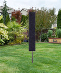 Backyard Game Changer Umbrella Clothesline, 12 Line Outdoor Drying Rack with protective cover in yard.