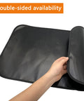 Person holding a Heat Resistant Fire Pit Mat For Deck And Tabletop 25 By 17 Inch Waterproof Oilproof Heavy Duty 4 Layer Pad