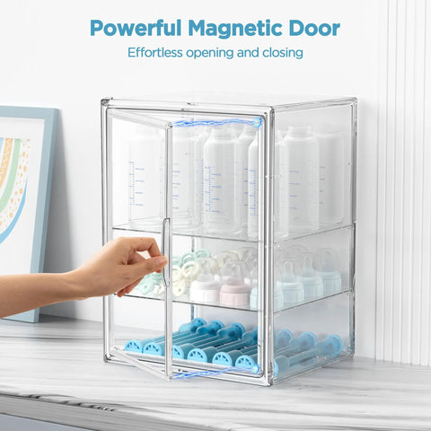 Three Tier Clear Acrylic Baby Bottle Storage Organizer with magnetic door showcasing bottles and pacifiers on countertop