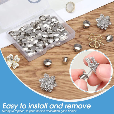 Hella Durable 40 Pack Locking Pin Back Keepers With A Rock Solid Spring Loaded Latch Nickel Plated Copper Clasp in a clear box, ready for use.
