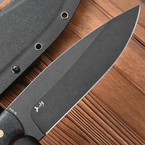 Close-up of the blade and sheath of the Fixed Blade Knife With AUS-10 Steel, Black Carbon Fiber Handle, Full Tang, And Sheath For Outdoor Camping And Hunting, 11.81 Inch Overall, 7.09 Inch Blade, Built Tough For Everyday Carry on a wooden surface.