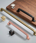 Assorted cabinet handles and pulls on wood board, featuring 2 Pack 12 Inch Cabinet Handles Champagne Bronze Warm Brass Cabinet Pulls