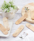 8 Pack Mini Fingerboard Set Maple Wood With Plastic Case Tiny Skateboards arranged on a table for desk tricks and fun.