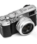 NC UV Silver Frame Lens Protector Filter For Fujifilm X100 Series Cams attached to camera body, showcasing design and fit.