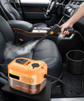 Heavy Duty 2500W Handheld Steam Cleaner With 4.5 Bar High Pressure For Kitchens And Bathrooms Quick Heating In Just Ten Seconds Adjustable Speeds To Tackle Grease And Grime Easy Use Portable Design For Home Cleaning Tasks And Car Detailing Projects in use on car seat, showcasing steam power and portability.