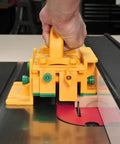 GRR-RIPPER Advanced 3D Pushblock With Handle Bridge Kit in use on a table saw, providing control and safety for woodworking.