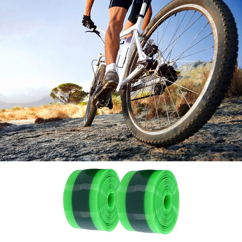 Heavy-Duty Inner Tube Protection Liner 2-pack for puncture-proof defense, universal fit 12-29 inch wheels, green and black on a bike ride