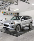 Garage setup with Heavy Duty Containment Mat For Garage Floor 7 Ft 9 In By 18 Ft Non Slip PVC Waterproof Floor Protector.