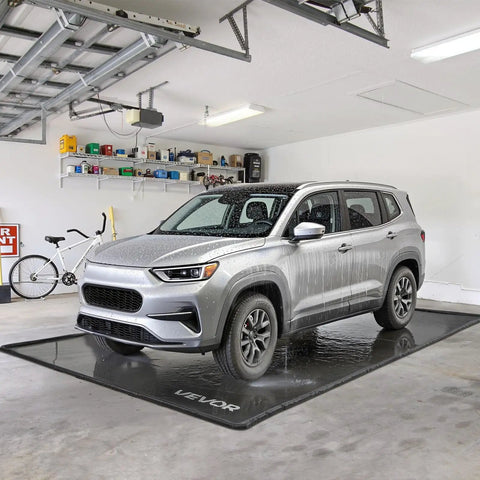 Garage setup with Heavy Duty Containment Mat For Garage Floor 7 Ft 9 In By 18 Ft Non Slip PVC Waterproof Floor Protector.