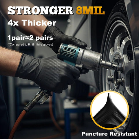 TitanFlex heavy-duty black nitrile gloves, 8-mil, XL, raised diamond texture, worn by a mechanic servicing a car wheel