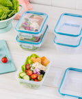 Total Solution Five Pack Three Cup Food Storage Containers With Leakproof Airtight Lids holding fresh salad on counter