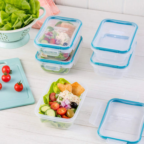 Total Solution Five Pack Three Cup Food Storage Containers With Leakproof Airtight Lids holding fresh salad on counter