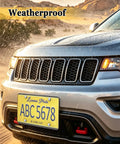 Crystal Clear License Plate Cover For Cars Bubble Shield High Visibility Tag Protector shown on SUV in wet conditions.