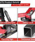 Close-up of Beefy Dirt Bike Stand And Motorcycle Lift Jack With 1000 Lb Capacity showing hydraulic damper, safety lock, warning sign, and thickened steel.