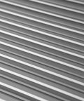 Close-up view of Aluminum Privacy HVAC Air Grille 24 By 24 With V Shaped Louvers Blocks 100 Percent View While Allowing Air Flow.