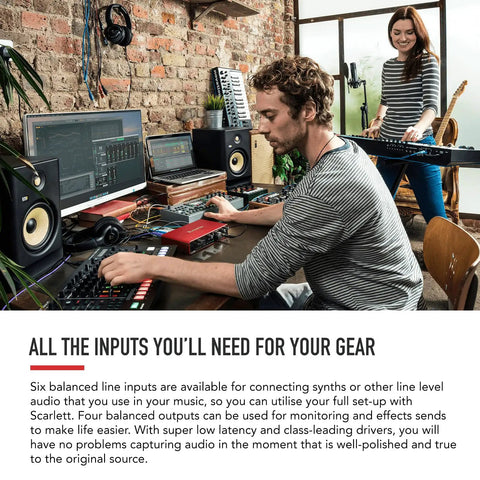 Man using Scarlett 8i6 Third Gen USB Audio Interface for recording in home studio setup with Six Line Inputs visible