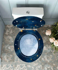 Round Resin Toilet Seat for Bathroom with starry night design, fits standard toilets, 14-15 inches wide and 17-18 inches long.