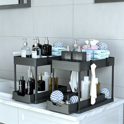 Heavy Duty Black Under Sink Organizer 2 Pack with Smooth Glide Sliding Drawers for Bathroom Cabinet used to store toiletries.