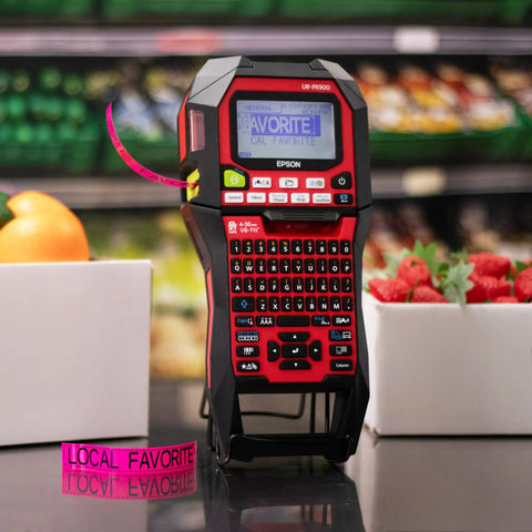 Hella Heavy Duty Label Maker And Portable Tape Printer For Asset Tagging Cable Wire Marking showing barcode display and printed tape.