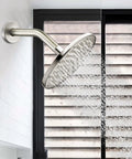 8 Inch Anti Leakage Ceiling Wall Shower Arm With Flange In Brushed Nickel Finish spraying water in bathroom