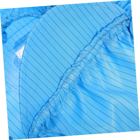 Close-up of blue anti static work caps showing breathable polyester mesh and flexible design for comfort and protection.