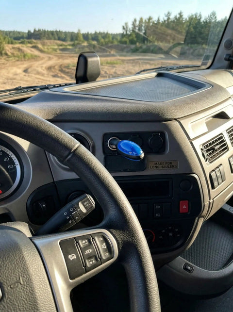 Ultimate Car Fuel Saver Device For Cars And Trucks installed in a vehicle dashboard enhancing gas efficiency and cost savings.
