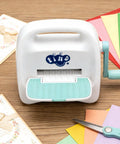 Portable Mini Die Cutting Machine With 3 Inch Opening, Foldable Manual Embossing Kit For Kids And Beginners on table