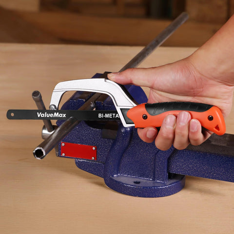 ValueMax mini hacksaw with orange and black handle, 10-inch bi-metal blade, in a blue vise