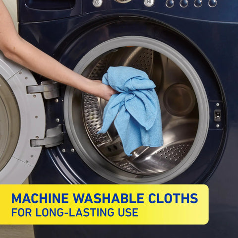 Hand placing Microfiber Cleaning Cloth Bundle 14 By 14 Inches Blue Pack Of 24 Washable And Reusable in washing machine