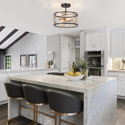 2 Light Modern Semi Flush Mount Ceiling Light With Clear Glass Shade in a sleek kitchen with a marble island and black chairs.