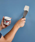 Ready To Use Spackling Paste White 8 Oz for patching small cracks and nail holes in plaster wallboard and wood, applied with spatula.
