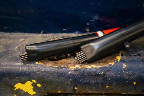 Heavy Duty Industry Standard 19 Needle Scaler Kit With Pistol Grip, 3000 BPM, 5.5 CFM At 90 PSI, on rusted metal surface