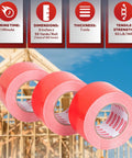 Three rolls of Heavy Duty Construction Seam Tape 3 Inch By 55 Yard Pack in front of building frame.