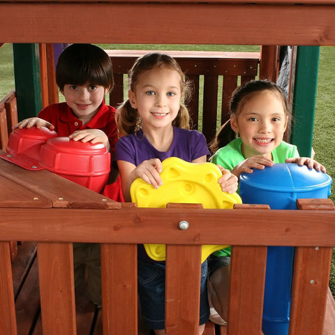 Children playing with Outdoor Rhythm Band Swing Set Music Play Kit Pack Of 3 Multicolor For Kids with drum, bongos, and rain wheel