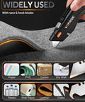 Front view of VOTREK box cutter utility knife with retractable blade and orange accents cutting carpet.