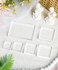 Set Of Six Clear Acrylic Styling Blocks And Flat Lay Props Ideal For Wedding Centerpieces And Product Shoots, Totally A Lowkey Essential For Content Creators Wanting That Polished Feed Aesthetic Vibe, displayed on fabric with decorative items.