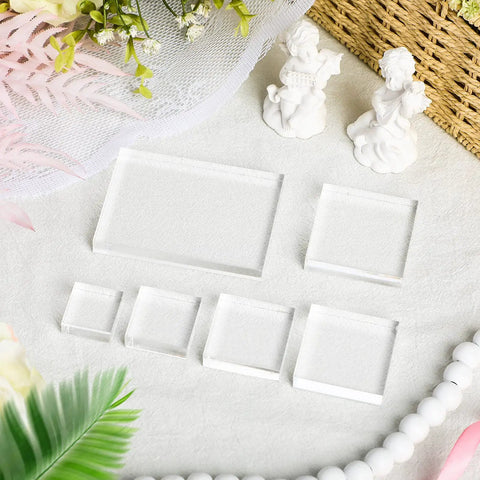 Set Of Six Clear Acrylic Styling Blocks And Flat Lay Props Ideal For Wedding Centerpieces And Product Shoots, Totally A Lowkey Essential For Content Creators Wanting That Polished Feed Aesthetic Vibe, displayed on fabric with decorative items.