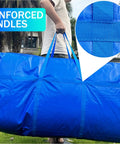 Person carrying Massive 66 Gallon Extra Large Storage Bag With Zipper And Tough Handles, reinforced for travel, blue color.