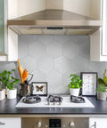 Kitchen backsplash featuring White Hex Porcelain Tile For Floor And Wall, 8.63 In Width By 9.88 In Length, Smooth Glazed Finish.