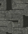 Close-up of Nikki Chu Black And White Zulu Signature Peel And Stick Wallpaper Roll bold modern pattern in black and white