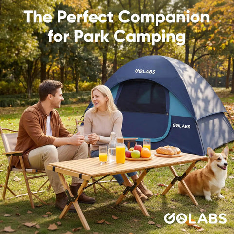 Two Person Camping Tent With Quick Setup In Minutes Waterproof With Mesh Top And Ventilated Door next to couple in park
