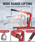 Heavy Duty Folding Hydraulic Engine Hoist Two Ton Portable Garage Cherry Picker with tough hook and casters in an auto shop.