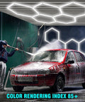 Person washing car under Hexagon LED Garage Lights Kit With 456W Output And 6500K Daylight, 14 hex panels overhead