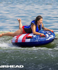 Airhead Stars And Stripes Towable Tube For 1 Rider Boating And Water Sports Made In The USA Heavy Duty Full Nylon Cover Patented Speed Safety Valve For Easy Inflation And Deflation Foam Padded Handles, rider on tube