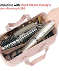 Portable pink Travel Hair Tools Case And Organizer For Airwrap And Dryer Attachments with handles, storing hair tools.