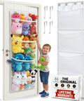 Over Door Stuffed Animal Storage Organizer With Hanging Mesh Net Hammock Plush Toy Holder for Bedrooms displayed on a door with toys