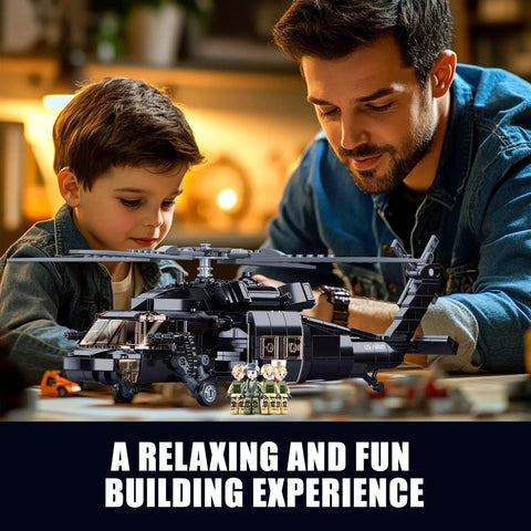Father and son building Black Hawk Inspired Helicopter Building Set for adults and teens, with soldier figures and foldable tail rotor.