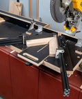 Professional Grade Miter Saw Jig Delivering Dead Nuts Accurate Cuts Without Any Sweat Featuring Its Rock Solid Angle Guiding Mechanism on saw table.
