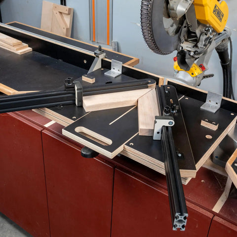 Professional Grade Miter Saw Jig Delivering Dead Nuts Accurate Cuts Without Any Sweat Featuring Its Rock Solid Angle Guiding Mechanism on saw table.